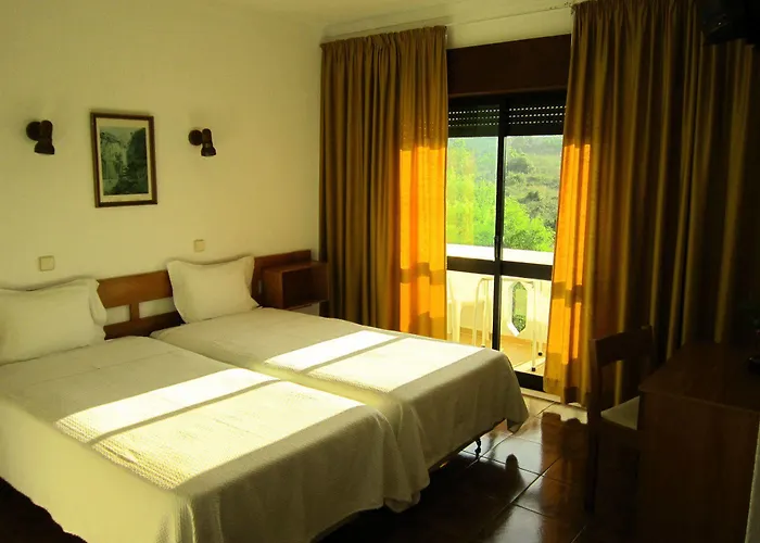 Отель Alcaide Портиман